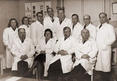 Skin-Venereal diseases clinic in Tallinn - Lai tn. 22
Left to right.
Sitting: Dr Schwarts, ?, Dr Strisch, Dr Poljak
Standing: ?, ?, ?, Dr Dreyer, Dr Uetoa, ?, Dr J. Rubanovitsch, Dr Handschmidt ?
