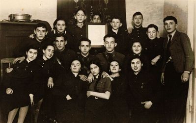 Tartu Beitar 1937 - holding Jabotinsky portree
From left to right
Top row: Haim Resnik, Lea Balonov (Heimann), Rudi Himmelhoch, Alter Pevzner, Lei Marienburger, Nonni Zeitlin, Mischa Gelb, Schlomo Sochatsevski
Middle row: Hanna (Anni) Aronovitsch (Eidelkind), Perle Levin, Jascha Sverdlov, from Riga, Leo Blumenfeld, Hene Gens
Bottom row: Lidia Morein (Ivanovski), Pessi Mendelev, Zenja Fainmann (Teitelbaum), Lea Eidus (Heimann)
