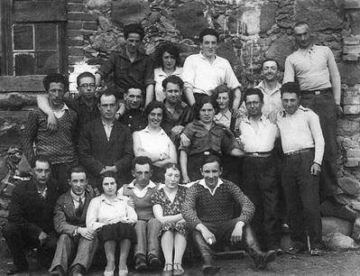Hachshara in Luunja near Tartu - 1932-33
Left to right.
Bottom row: ?, ?, ?, Folka Dubin, Fanny Harary (Schajevitsch), Rafael Bas
Middle: ?, ?, ?, ?, ?, Lasar (Lazik) Goldberg, Tsilla Vigodski, Sonja Margalit (Muschkat), ?, Berl Verschovski
Top row: ?, Manja Baran, Nechemia (Njuma) Levanon, ?, Reuven Muschkat
