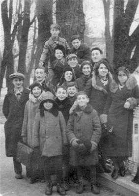 Tartu Hashomer youngsters with "madrichim" ~ 1932
Left to right
5 youngsters in front: ?, Sima Schkop, ?, ?, ?, ?
Next row: ? ?, ?, Rebecca Haitov, ?
Next row: ?, ?, Nechamia Levanon (Levitan)
Top row: ?, Dov Hameiri (Maisel)  
