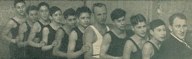 ~1934. 
Right to left: Leopold Markovitsch, Jakob Aronovitsch, Koppel Koslovski, Isak Haitin, instructor Lukin, ?, ?, ?, ?, ?, Izi Goldmann
