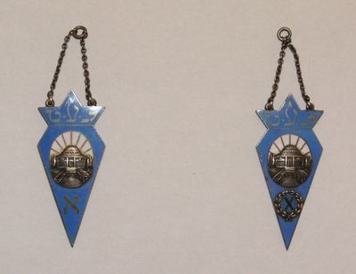 Tallinn Jewish gymnasium badges
Left: First graduation of the Hebrew classes (1937) - belonged to Isidor Goldmann
Right: 10th graduation of the gymnasium (1936) - belonged to Jossi Goldmann
