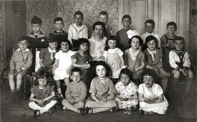 Tallinn - 1937. Jewish Hebrew Kindergarten "Tarbut" in Tallinn - 1937
Mirjam Schampal (Schulklepper) with children.
Left to right.
Top row: Faivi Freidin, Leva Zak, Leo ?, Josif Rybak, Boris Goldberg, ?, Benjomin Mihailovski
Middle row: ?, ?, Feige Schenkman, ?, Mirjam Schulklepper, ?, Judith Rubinstein,  Scheine Shenkman, Rafael Rusinov
Bottom row: ?,  Taubi Mazkin, Sara Vasser, ?, ?
