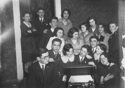 Tallinn - 1930. gathering by Anna Migdal
Left to right.
Standing at left (4):  Basja Danzig, Wulf Gerschanovitsc, Viktor Klompus, Anna Stein (Migdal)
Standing at middle (6): Anna Klas (Gurevitsch), Fanny Jakobson, Riva Itzoch, Fanny Raichmann, Yamima Rom (Gurevitsch), Isai Levin
Sitting at bottom: Abram Danzig, David Gerschanovitsch, Emma Jakobson, Osja Itzoch, Gurevitsch, Bluma Rubanovitsch (Gabovitsch), Hansi (Anna) Hof
