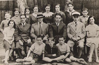 Tartu Jewish school
Left to right.
Top: Mischa Tuvia, Hanna Gens, Pessi Mendelev, Riva Vagenheim, Riva Drui, Ljuba Schenkman (Zak), ?, Haim Resnik
Middle row: Hanna Aronovitsch (Eidelkind), Ezriel Schaput, ?, David Solomon (school director),  Leib Levitin, Mulja Spungin, Musja Drui
Bottom: ?, ?, ?  Spungin? Nodel?  
