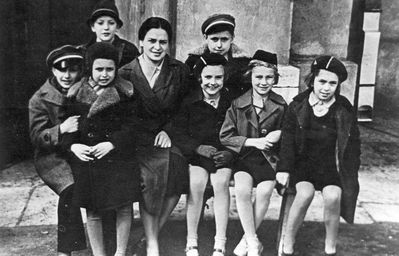 Tallinn - 1938.  Jewish Gymansium - ~1938/9
Left to right.
Standing:  Liebert (Liebi) Kantor, Donald Dubrovkin
Sitting: Harry Hoff, Israel Genkin, Teacher Basja Meiertal (Schneeberg), Ester Vee (Rochlin), Dveira Rusinov (Vigderhaus), Frieda (Fritzi) Nikitin (Slomka)
