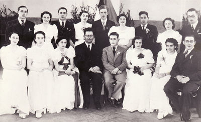 Tallinn - 1938. Jewish gymnasium 1938 graduation
Left to right.
Standing: Fili Brin, Scheina (Genja) Reichman (Koslovski), Hessi Aronovitsch, Dvora (Veevi) Biek, Wulf Lerenmann, Fanny Danziger, Benjamin Kagan, Sima Schkop, Salman Eidus
Sitting: Resi Epstein (Strasch), Bella Press, Jette Rein (Gleser), Estonian teacher Velder, Abram Gutkovitsch, Hanna Goldberg, Jetti Hirschmann, Natan Asnovitsch 
