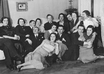 Danzig (Itskovitsch) Berta birthday - 23/2/1934
Left to right.
Top row: Sara Bujanover (Citron), ?, Leo Ginovker,  Lidia Sapir (Vigderhaus, b. Markovitsch), Jakob Vigderhaus,  Anna Stein (Migdal), Isi Itskovitsch, Raja Bam (Koslovski), ?
Middle row: ?, Berta Danzig (Itskovitsch), David Bakscht, Max Boruhov, Gina Besprozvanie (Slutski)
In front: Ljuba Schein (Citron)
