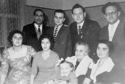 Levins etc
Left to right.
Sitting: Ruth Migdal (Levin), Lia Epstein, Tsilla Auguston, Perle Esse Levin (Sack), Doris Raskin (Levin)
Standing: Sima Levin, Aleksandr Levin, Isai Auguston, Isai Rosenfeld
