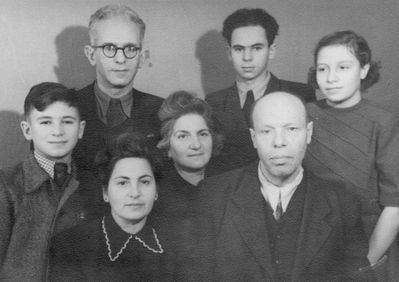 Judeikin family ~1948
Left to right.
On top: Solomon Judeikin, Lev Judeikin, Keili Haitov
Jossi Judeikin, Musja Schats, Abram Haitov
At bottom: Rosa Judeikin (Glickman)  
