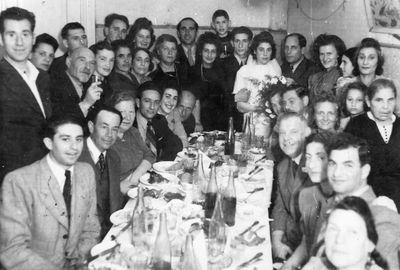 Adik Karol and Riva Tsivan wedding - 21.8.1947
Left to right.
Sitting around the table: Viktor Teitelbaum from Tartu, Turetski, Haje Teitelbaum (Schames) from Valga, Ilja Dubin, Sonja Dubin, Elja Hazke Karol, ?, ?, ?, Riva Zimbalov (Spungin), Alter Zimbalov, First wife of Turetski

Standing: Viktor Teitelbaum from Valga, Minna Abramovitsch, with glass Gordon, Jossi Stein, Golda Stein, Rachel Karol (Zivian), Rachel Zivan (Sigelevitsch), ?, Frieda Feiman (Teitelbaum) - above, wife of Gordon (below), mother of Adik Karol, ?, Malka (Karol), Isak Beilinson (boy), Adik Karol, Riva Karol (Tsivan), ?, Zhenja Fainmann (Teitelbaum), Ester Abramovitsch - girl above, Ranja Manoim (Blum) - girl below, Sara Blum (Zivjan) - above Ranja, ?, Hana-Rischa Beilinson (Novik)  

Keywords: [T] [Z] [A] [B]