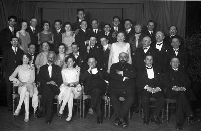 Tallinn - 1928 - 26/5/1928 - Tallinn Jewish Gymnasium graduation celebration
Left to right.
On the very top: Boris Klompus
Top row:  Isi Lopavok,  Golda Sverdlov, Leut. Kommusaar (state defence education), Hana (Ljala) Delsky, Emanuel (Boris) Lourie, Lena Levitan,  Aron Taub, Larionov, Leo Epstein, Geinrichs G., E. V., Deters, Dr Heiman Rubin, Dr Mordechai Bassel

Middle row: Zitomirski, Bernstein, Rosa Klompus, Dina ?, Jevgeni Ivanovitsch Gildebrand (russian language and literature),  Evgeni Refes, Nosson Eidus,  Margarita Ivanovna Gendelbach-Pensa (estonian language), school counselor Moritz Christianovitsch Sauerbrei (german language),  Maks Klompus, Schmarja Tamarkin

Bottom row: A. L., director Samuel Gurin, Sonja Lopavok, the Chairman of the Estonian Jewish Cultural autonomy council Hirsch Aisenstadt, Cantor Jossif Gurevitsch, School advisor adv. Gurevitsch, school doctor Friedland

backside: Было очень, очень хорошо. В помещении "Еврейского Общественного Собрания" (Еврейский клуб). Снимал Сергей Яковлевич Голубев. Д-р Кломпус такой дивный конферансье, очень веселый. Может быть из незнакомых Вам Вал. Серг. приглашенные и учителя.
1й ряд (нижний ряд, слева направо) - А.Л., директор, С. Л., господин Айзенштадт, кантор Гурвич, "Koolinõudnik" адвокат Гуревич, школьный врач Фридланд.
2й ряд (справа налево) - г-н Тамаркин, д-р Кломпус, г-н Зауербрей, М.И.Г.П. (не люблю ее), Н.Э., Ж.Р., наш хороший Е.И.Г., Диночка, Р.О. Кломпус, д-р Бернштейн (учитель), г-н Житомирский
3й ряд (слева направо) И.Л., Г.С., лейтенант Коммусаар (обучал наших мальчиков "военщине" - славный, но такой смешной), ваша покорная слуга Ляля, Б.Л., Л.Л., А.Т., г-н Ларионов (он славный, но глупости-же он болтал!!! Зато знает массу русских песен), Л.Э., Г.Г., Э.В., Дэтерс, д-р Рубин (приглашен как член правления культурного совета), д-р Бассель (говорят, что он хороший человек, но я знаю, что он ужаснейший педант и нуднейший господин) и Б.К.
