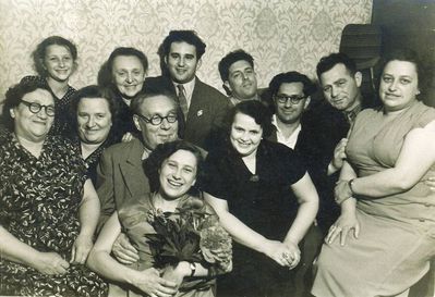 Lutrin, Scherman etc
Left to right.
At bottom: Avigail (Gaya) Lutrin (Scherman)
Middle row: Sonya Scherman (Strasch), Gita Jakobson (Lutrin), Rafael Jakobson, Edith Lutrin (?), Lyuba Janovski (Scherman)
Top row: Ira Janovski, ?, Herz Lutrin, Aleksandr (Alik) Jakobson, Hirsch Scherman, Mischa Janovski
Keywords: [unknown]
