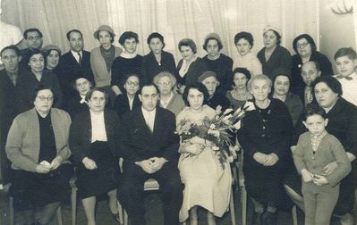 Leo Zak and Mascha Kitt wedding
Left to right.
Top row: Ilja Kitt, Hirsch Scherman, Rachel Kljutschik (Kitt), Golda Kitt, Hirsch Kitt, ?, ?, ?, ?, Hesse Kit (Pozaisky), Gaya Scherman, Sonya Scherman (Kulman), Sonya Scherman (Strasch)
Middle row: ?, ?, ?, ?, ?, Lyuba Janovski (Scherman), Haim Kitt, Leo Kitt
 Bottom row: Schifre Rubinstein, Ida Zak (Scherman), Leva Zak, Mascha Zak (Kitt), ?, ?, Dina Kitt (Citron)
Keywords: [unknown]