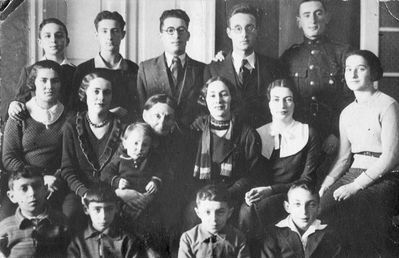 Raichmans and Goldmans ~1933
Left to right:
Top row: Jossi Goldmann, Gutti Raichman, Isi Raichman, Arke (Leo) Raichman, Dodik Raichman
Middle row: Berta Raichman, Rosa Raichman, ? with Harry Raichman), Marjascha Raichman, Fanni Raichman, Haja Raichman
Bottom row: Gera Raichman, Harry Goldmann, Isi Raichman, Leo Goldmann
