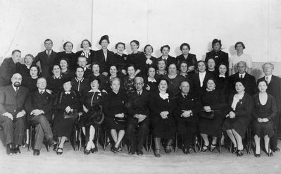 Tallinn - 1938. Parents and teachers committees of the Tallinn Jewish Gymnasium in 1938/9
Left to right.
Top row: Motel Zitomirski, Sonja (Sara) Scherman (Strasch), Gute Sack (Scherman), ?, Ida Sack (Scherman), ? 
Middle row: ?, ?, ?, Ida Zak (Scherman), ?, ?, Isak Bachmat, ?, ?, Basja Meiertal (Schneberg), ?, ?, ?, ?, ?, ?, ?, ?, Schifre Rubinstein (Zak)?, Schmarja Tamarkin
Bottom row: Josef Gurevitsch, ?, ?, ?, ?, Samuel Gurin, ?, Hirsch Aisenstadt, ?, ?, ?
