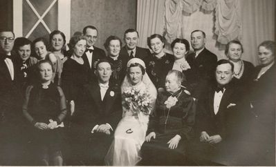 Dr Rivlin and Rebeka Rivlin (Kaplan) wedding
Left to right.
Sitting: Marjascha Sorkin (Kaplan), Dr Rivlin, Rebeka Rivlin (Kaplan), Ida Kaplan, Sascha Kaplan
Standing: David Sorkin, ?, Kaplan, Natascha Kaplan, ?, ?, Rose Schein (Kaplan), Efraim Schein, ?, Raja Gorosch (Kaplan), Kolja Gorosch, ?, ? 
