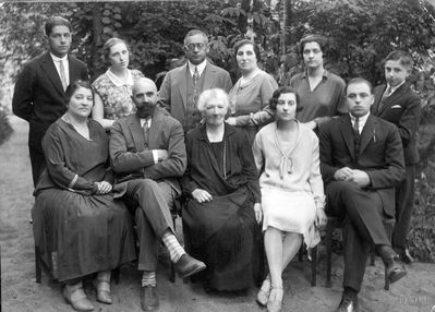 Teitelbaum, Tuch families 1920s-30s
Left to right
Sitting: Rebecca Teitelbaum, ?, Nechame Tuch, Olli Jachnin (Teitelbaum), Iser Jachnin
Standing: Benni Teitelbaum, ?, Leib Teitelbaum, ?, Sara Lipavsky (Teitelbaum),  the brother of Isser Jachnin
