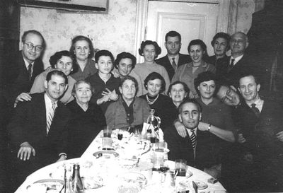 1960 - Farewell party to Gitta Heimann (1960 emigrating to Israel)
Left to right:
Standing: Zalman Eidus, Reni Schames, Miriam Tamarkin, Arik Eidus, Lea Balonov (Heimann), Riva Koslovski (Zivjan), Boris Smolenski, Lea Eidus (Heimann), Etti Paturski, Herman Zivjan
Sitting: Jacob Koslovski, Rasse Furmanski (Heimann), Gitta Heimann, Rasse Paturski, Fanni Smolenski (Heimann), Aron Tamarkin, Etti Majofes (Schein), Avram Paturski, Teffi Majofes  
Keywords: [P] [E] [K] [B] [Z] [M] [com1960]