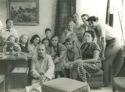 By Haitovs. 1958 
Sitting in foreground: Aleksander ("Kika") Blumberg.
Sitting from right: Musja Haitov (Gutman), Isak Haitov, Daniel Hopp, ?
Standing from right: ?, ?, Schmuel Haitov, ?
