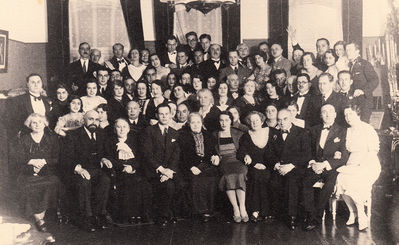 Wedding of Eduard and Anna Klas-Glass. 3.6.1934. Tallinn
Left to right. Sitting first row: Tsila-Feiga Tamarkin (Klas), Jossef Gurevitsch, Esther Gurevitsch (Goz), Eduard Klas-Glass, ?, Anna Klas-Glass (Gurevitsch), Stanislava Klas-Glass (Fruchtmann), Herman Klas-Glass, ?, ?
Second row: Selma Slonim (Tamarkin), ?, Ber Goldmann, ?, ?, Rebekka Feinstein (Lopatnikov), ?, ?, ?
Third row: ?, ?, Ester (Fira) Hanson (Klas), Raja Drabkin (Feinstein), ??????, Benno Markovitsch, Isidor Goldmann
Fourth row: ?, ?, ?, ?, ?, ?, ?, ?, Mark Kolovsky, ?, Aron Feinstein
Top row: ?, ?, ?, ?, ?, ?, ?, Maks Feinstein, ?, ?, Herman Meiertal, , ?, ?, Ruth Rybak (Klas-Glass, nee Goldmann), Anna (Baby) Feinstein, ?, ?, ?, Grete Elian, ?, Irene Falstein (Klas-Glass), ?, ?
