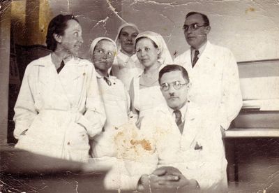 Tõnismäe hospital doctors and nurses. Tallinn, ~1939 
Standing at the far right dr. Isak Levin (1895-1941). Dr I. Levin stayed in Tõnismäe Military Hospital with the last patients when the rest of the doctors left (before nazi invasion). Was killed. 
Keywords: [L]