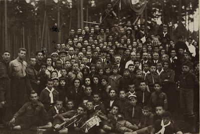 Rabbi Mordechai Nurok posing in the middle of a group of members of the Zionist Scouting "Gedud Tzofim - Bar Kochba" in Tallinn. Estonia, 1925
