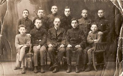 Tartu - 1921. School picture. March 1921.
According to LEA 1617 text - Farewell party to Efraym Epstein (aliya to Palestine). In the middle - Leib Levitin, Levitin sons Abram and Samuil are sitting from both sides. 
