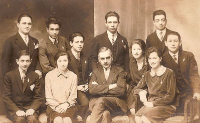 Tallinn - 1928 - 26/5/1928 - Tallinn Jewish Gymnasium graduation celebration
Left to right.
Top: Aron Taub, Isi Lopavok, Emanuel Lourie, Boris Klompus, Golda Sverdlov, Nosson Eidus, Zenya Refes
Bottom: Leo Epstein, Lena Levitan, Math. and chemia teacher Sergei Yakovlevich Golubev, Sonya Serman (Lopavok) 
