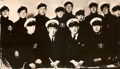 Latvian and Estonian Beitar sailors team from Beitar owned ship "Theodor Herzl". May 1938.
Left to right.
Sitting: Abram Bash, Latvian Captain Rotskol (?), officer Rivlin, Tuvia Smolenski 
Standing: Lachman, Moshe Grinberg, Hirsch Rabinovitsch,  Monya Levin, Haim Zudelman, Rafael Orfang, Monya Lifshits, G. Noiman, Eliezer Zohar (Helman)
