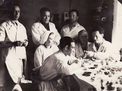Railway polyclinic 1948
Left to right.
Standing - Benjamin Gitelson (dental technician), ?, ?
Sitting - ?, Jacob Blechman (dental technician), ?, Jakov Pats (dental technician)
