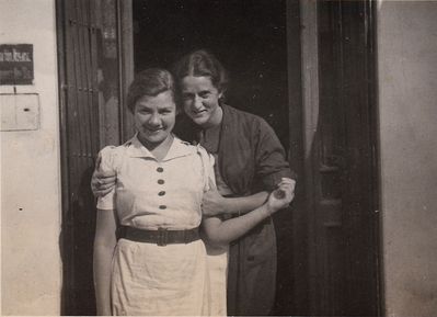 Riva Kliksberg (Kaplan) left and Lilian (Ljuba) Katsin (Katzin)
in front of the shop at Poe t. 3 in Tartu. 11.8.1931

